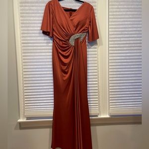 Long orange dress with sleeves. Never worn. Custom made.